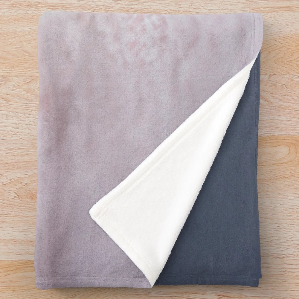 Soft, plush kitten-themed blanket in pastel colors