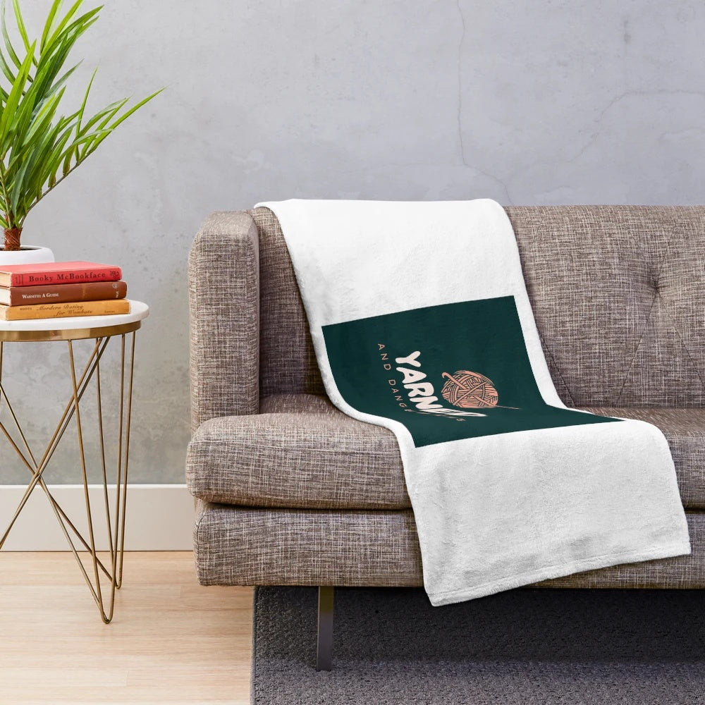 Soft and textured plush blanket with a knitted yarn design