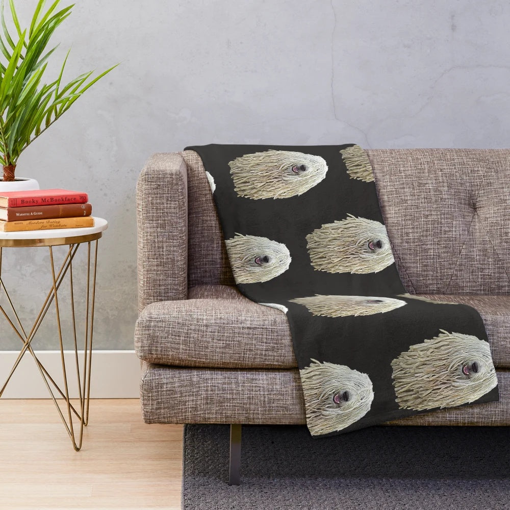 Soft and fluffy plush blanket featuring a Komondor dog breed with its distinctive dreadlock-like fur