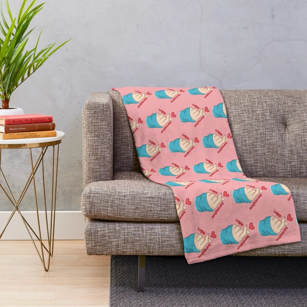Cozy plush blanket featuring a finger heart design and Korean text "saranghae