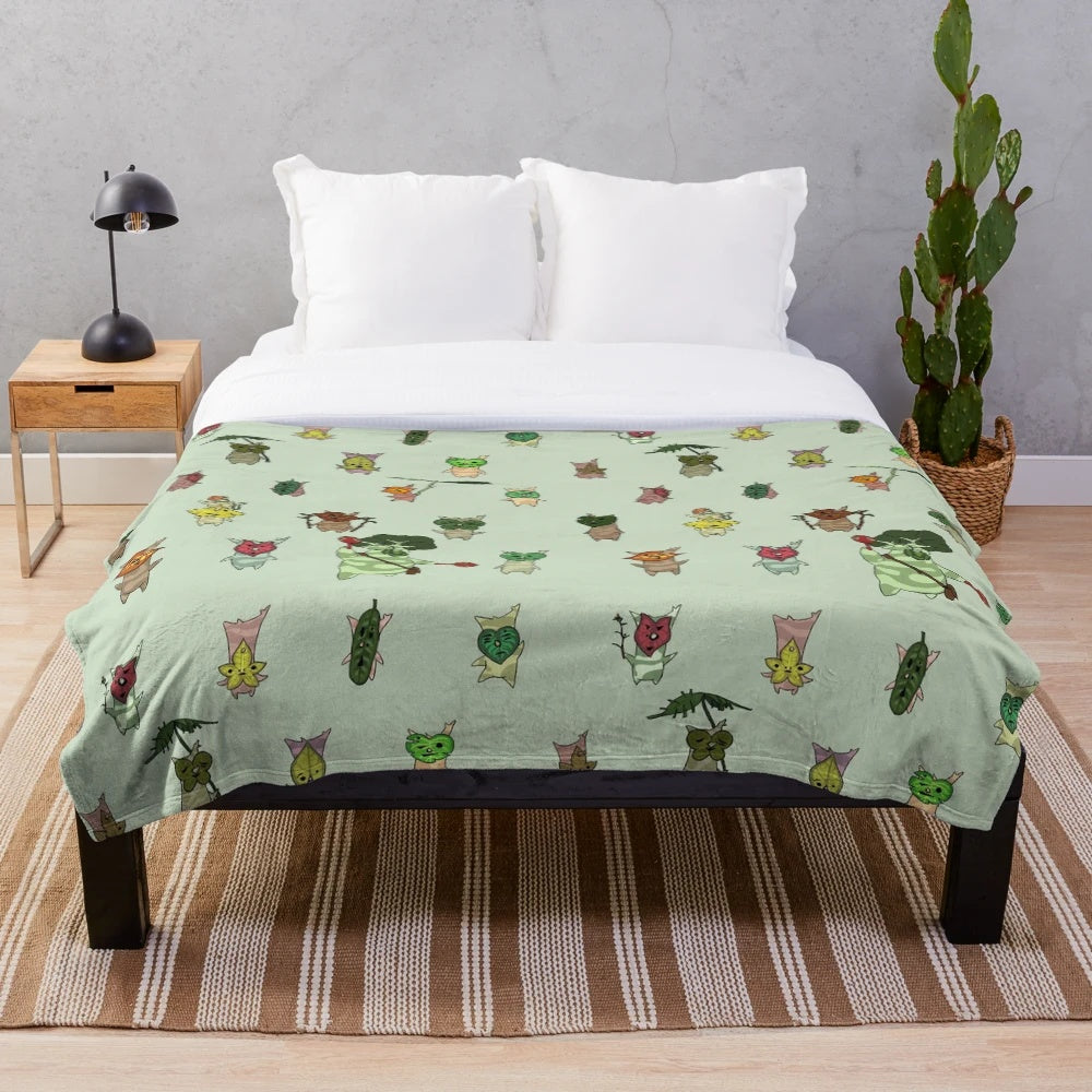 Korok-themed plush blanket with a whimsical pattern and soft, cuddly texture