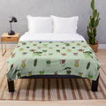 Korok-themed plush blanket with a whimsical pattern and soft, cuddly texture