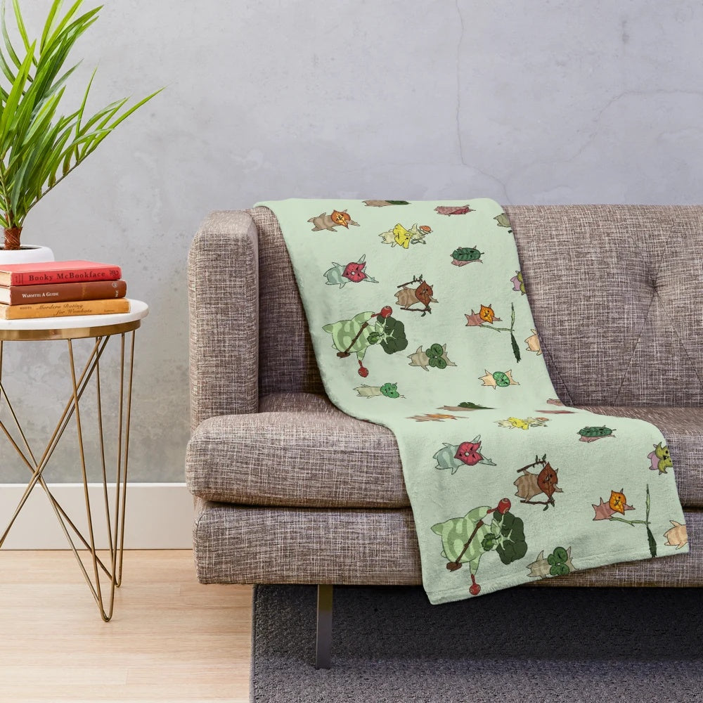 Korok-themed plush blanket with a whimsical pattern and soft, cuddly texture