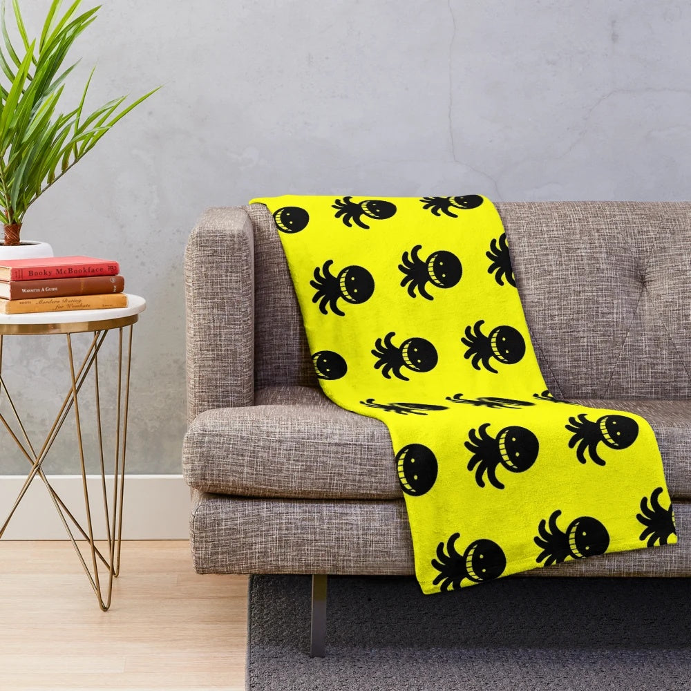 Korosensei plush blanket with soft yellow tentacles and a smiling octopus face