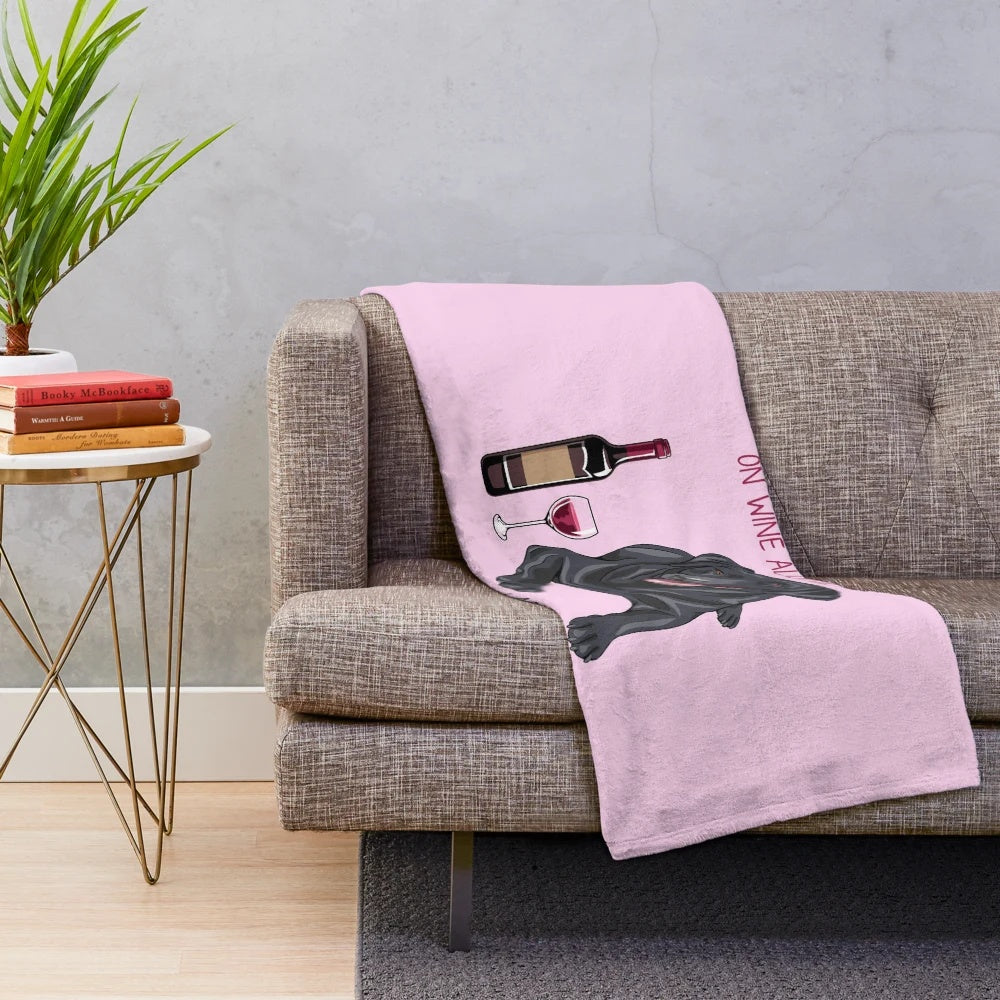Labrador dog on a plush, cozy blanket