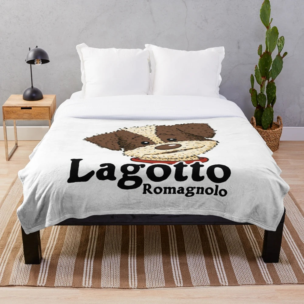 Lagotto Romagnolo dog breed on a plush blanket