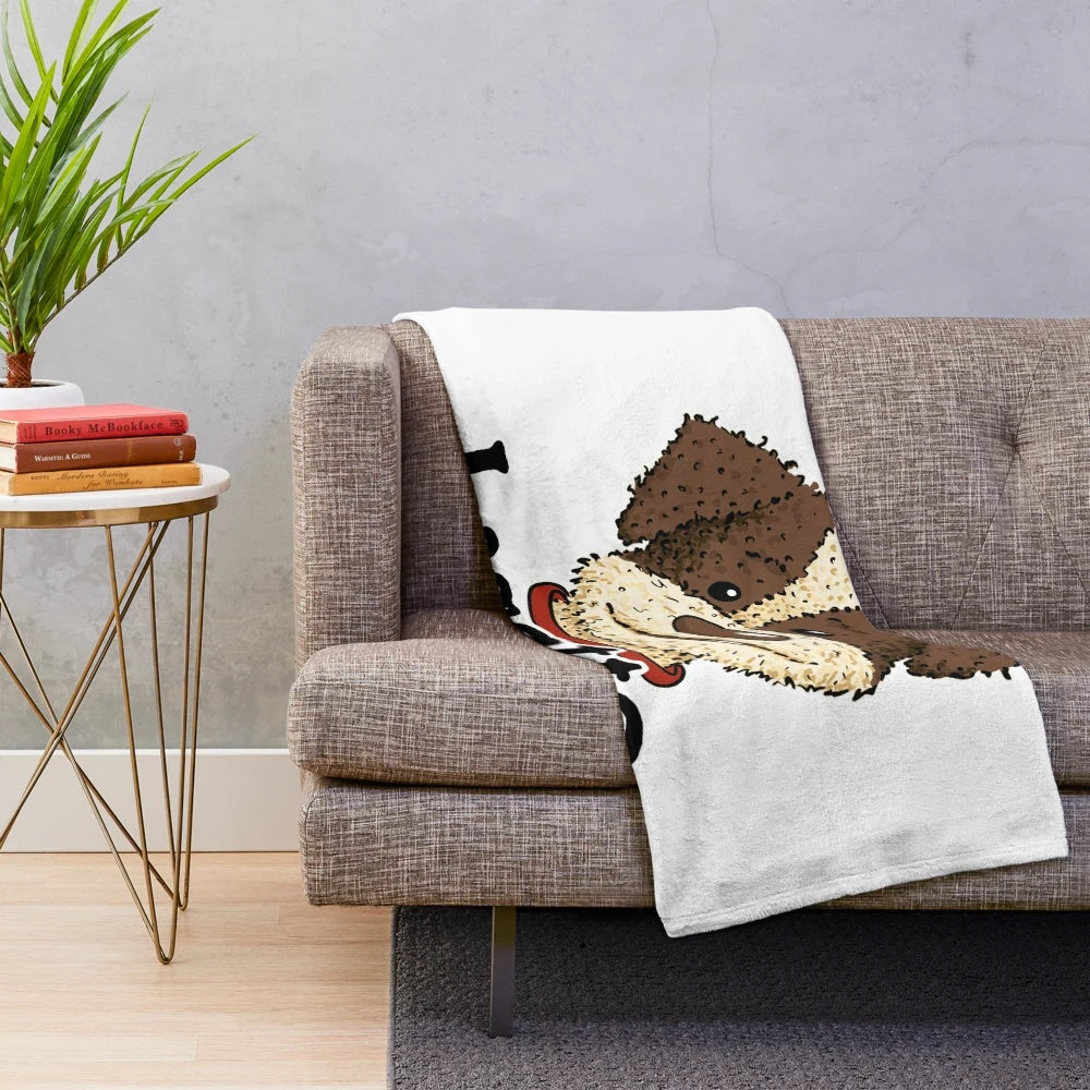 Lagotto Romagnolo dog breed on a plush blanket