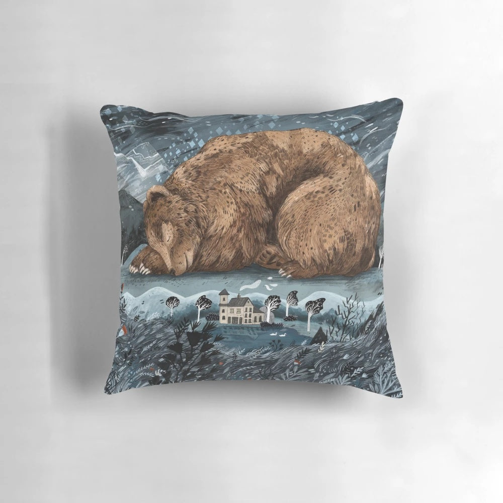 A nature-inspired lake house pillow featuring a bear illustration, perfect for cozy home decor.