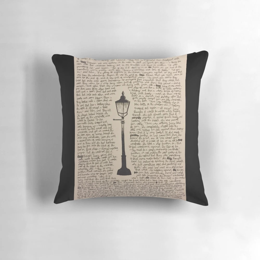 A decorative pillow featuring a sketch of a lamp post, inspired by the Chronicles of Narnia series.