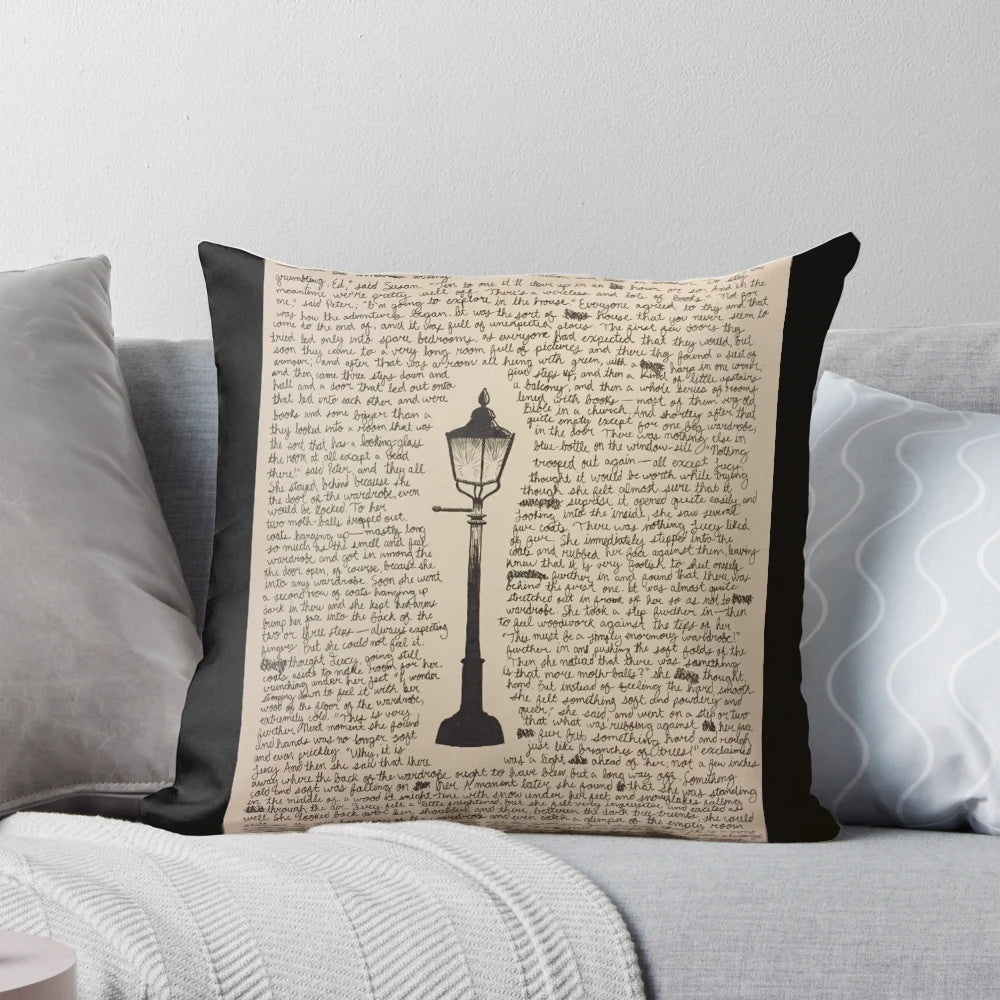 A decorative pillow featuring a sketch of a lamp post, inspired by the Chronicles of Narnia series.