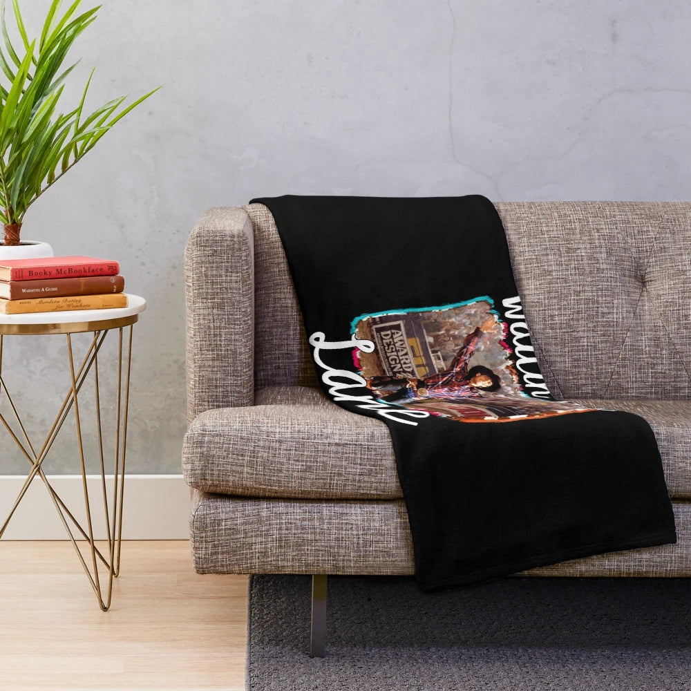Plush blanket featuring a cowboy riding a bull, inspired by the movie "8 Seconds" and Lane Frost