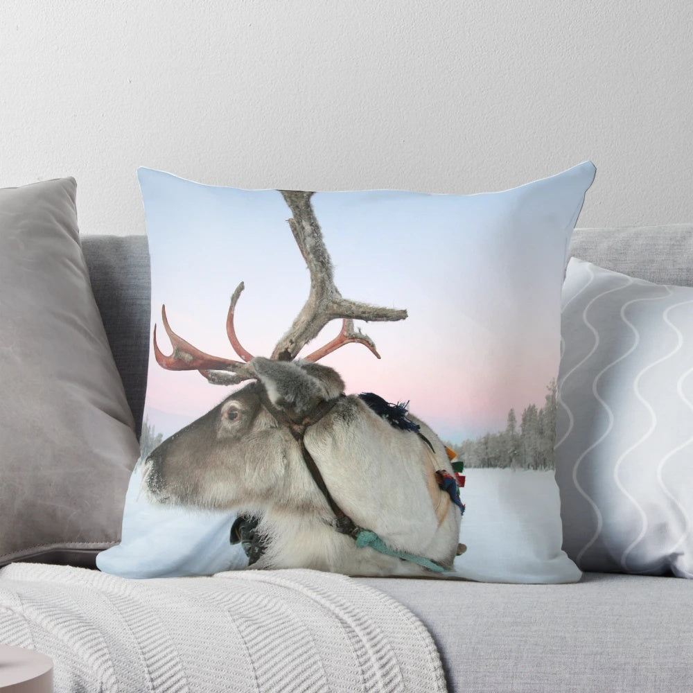 Soft and fluffy Lapland reindeer pillow with a snowy winter design