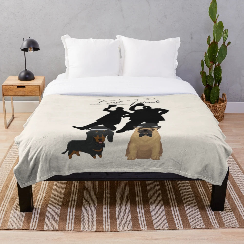 Soft plush blanket featuring the classic comedy duo Laurel & Hardy with their dog friends