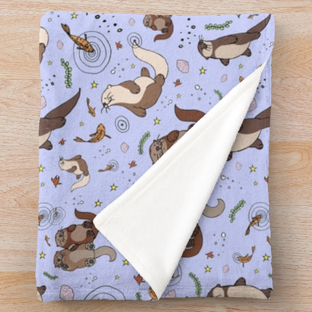 Soft and plush lavender otter pattern blanket