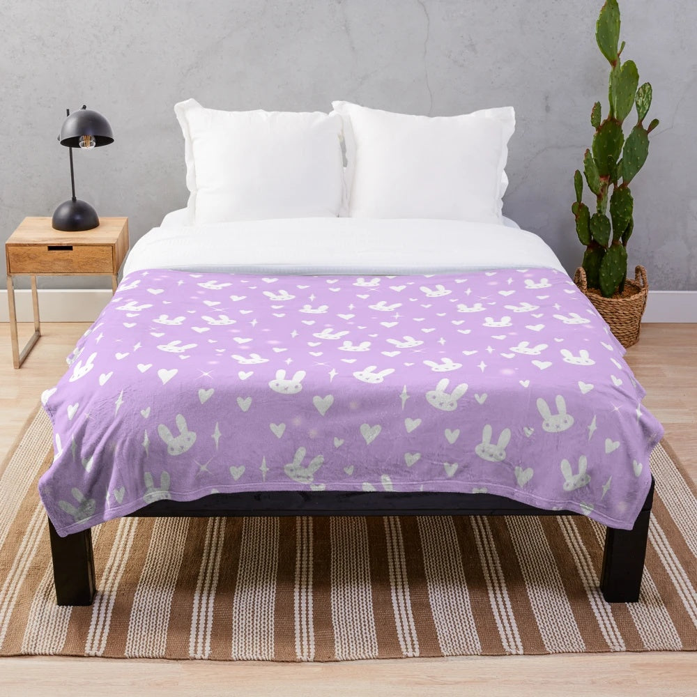 Purple plush bunny blanket with a soft, fluffy design