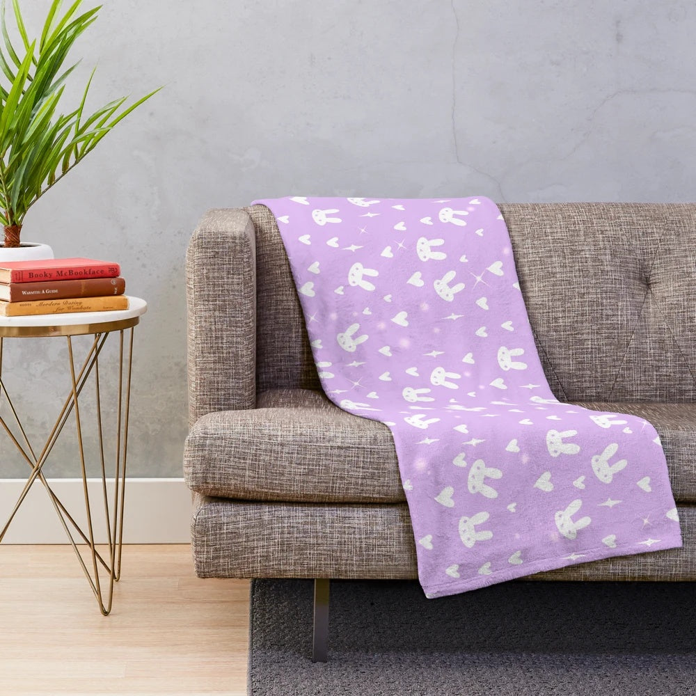 Purple plush bunny blanket with a soft, fluffy design
