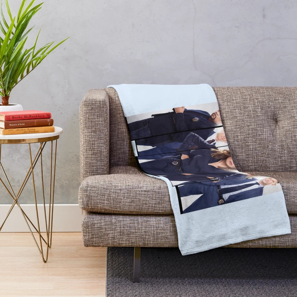 Law & Order SVU inspired plush blanket with characters and logo