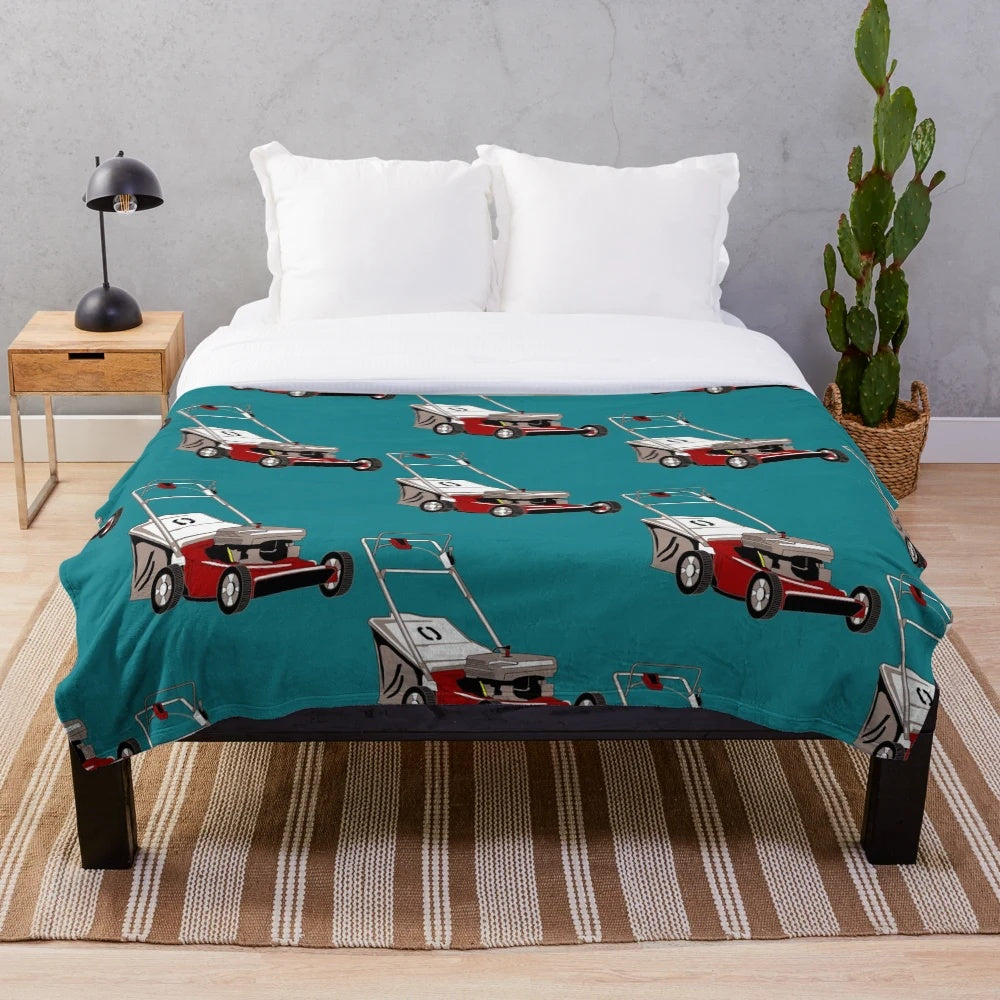 Plush blanket featuring a lawnmower design for tractor and farming enthusiasts