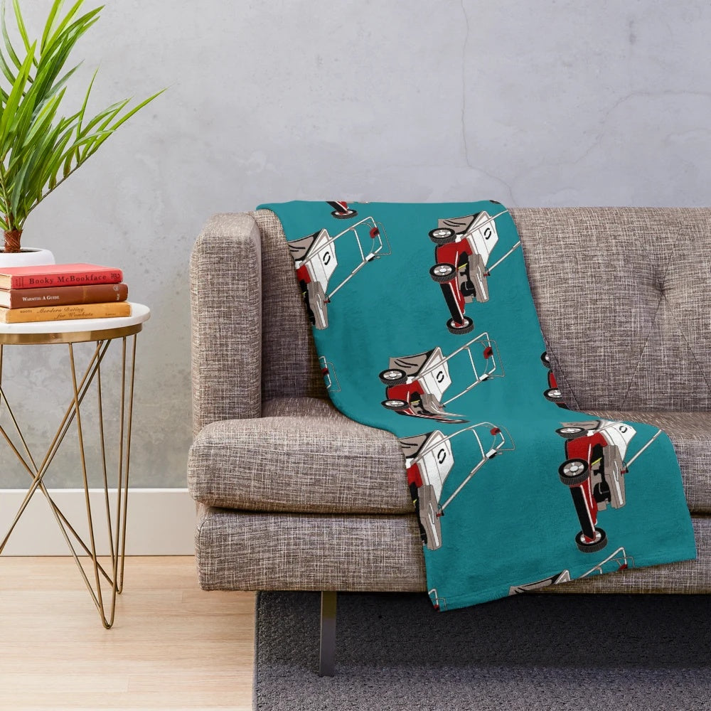 Plush blanket featuring a lawnmower design for tractor and farming enthusiasts