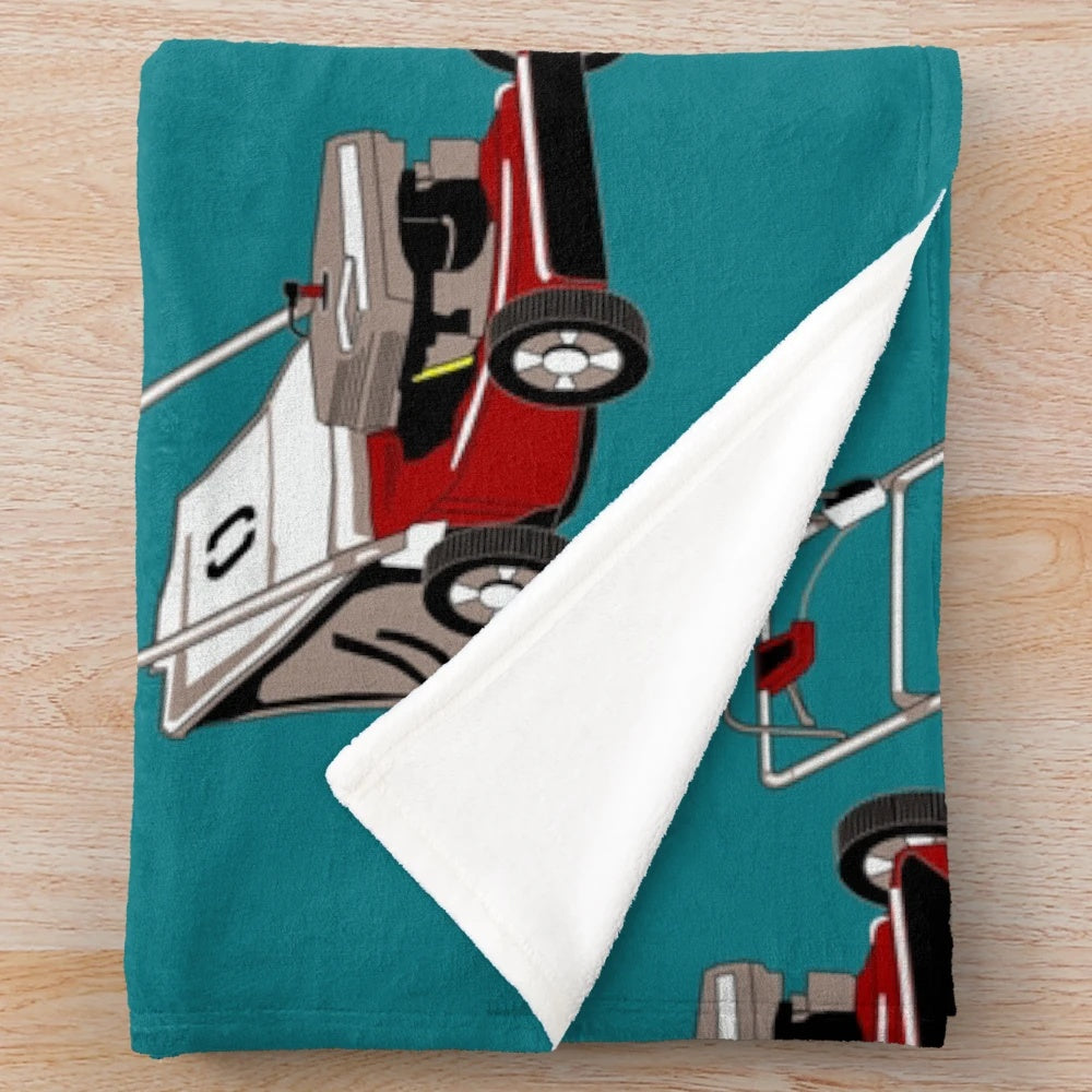 Plush blanket featuring a lawnmower design for tractor and farming enthusiasts