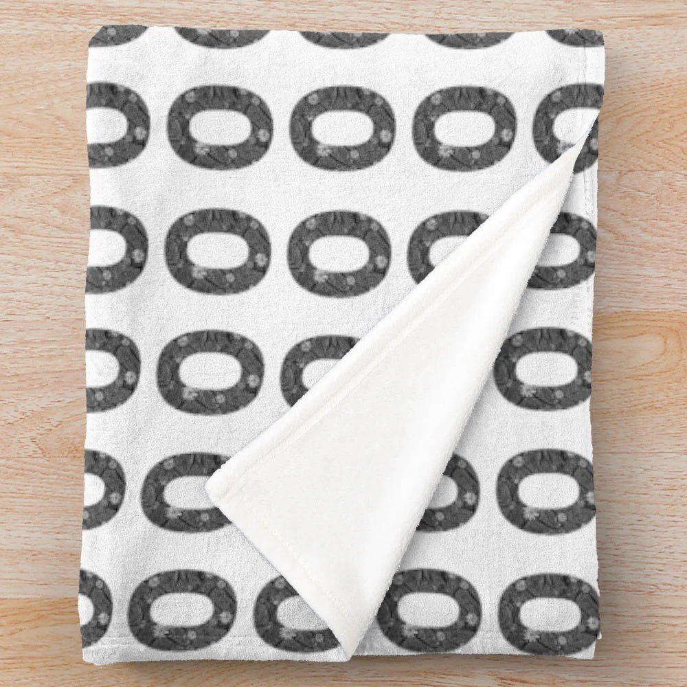 Plush blanket with stylish letter O pattern in black and white