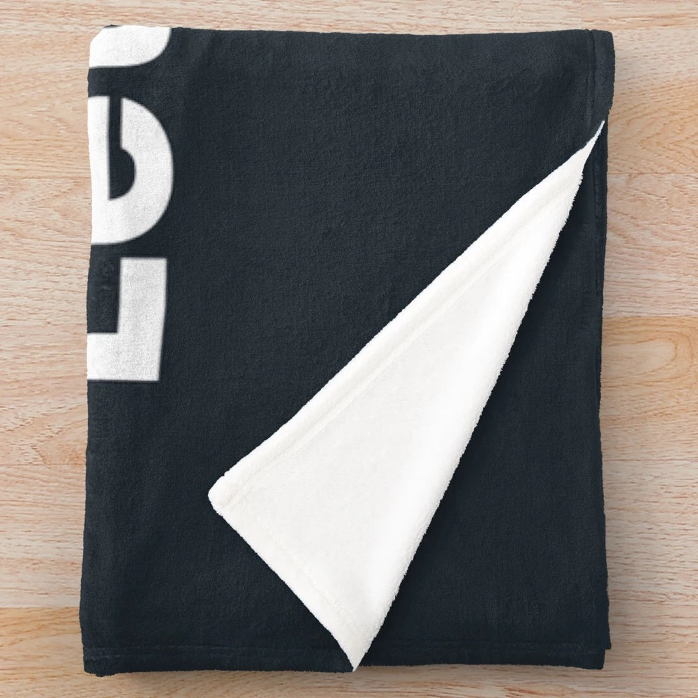 Soft, black and white plush blanket featuring the Letterboxd logo for movie fans and cinephiles