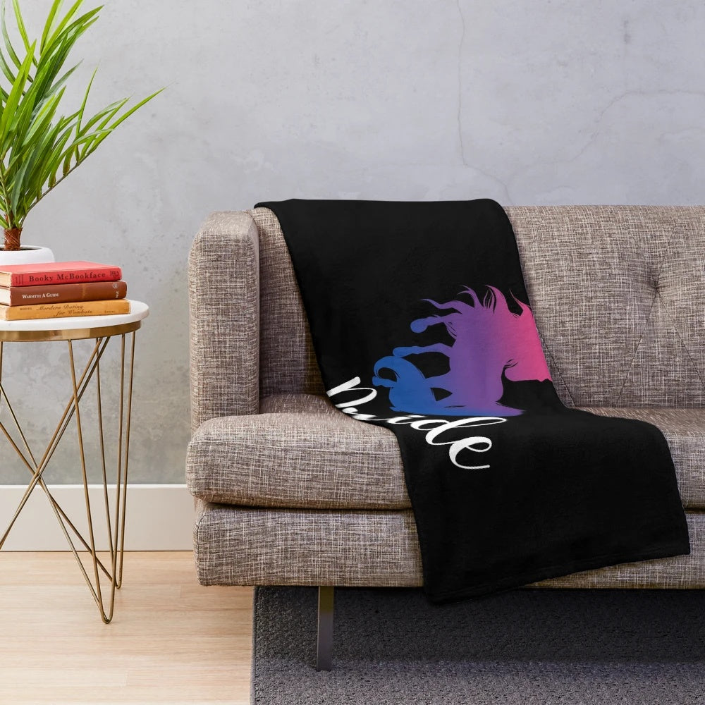 Soft and fluffy LGBTQ pride unicorn plush blanket in bisexual flag colors