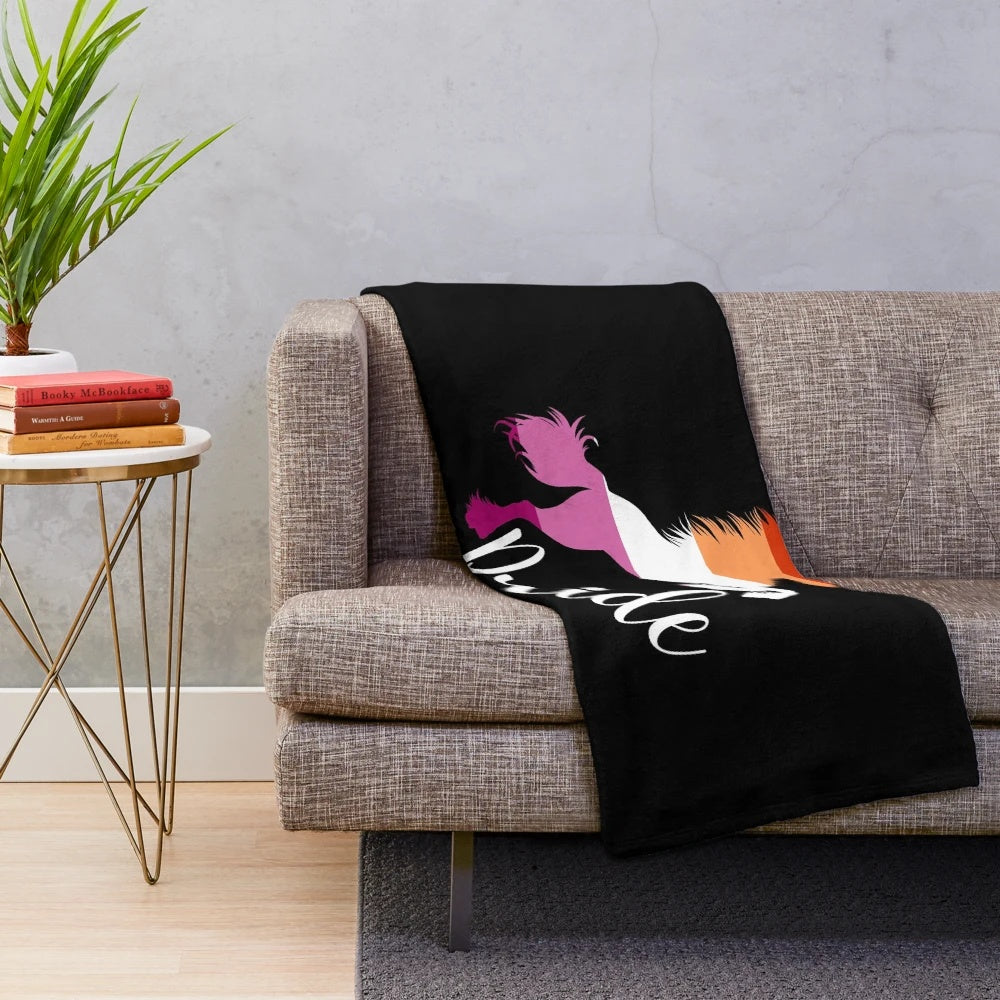 Plush unicorn blanket in lesbian pride colors