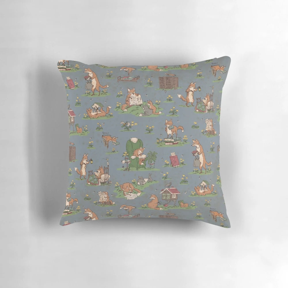 Decorative throw pillow featuring an illustrated design of foxes in a library setting