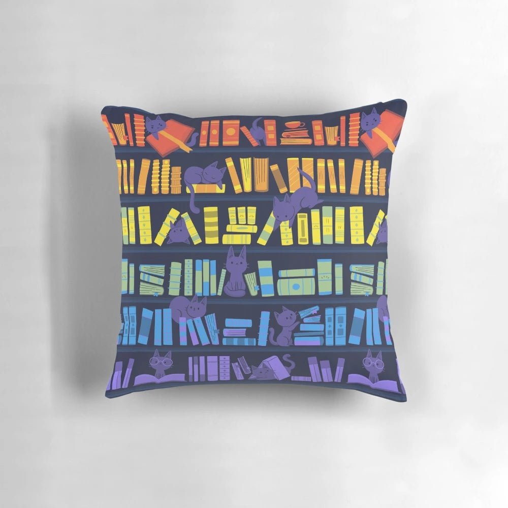 Soft, colorful pillow featuring two adorable kittens sitting among books and a rainbow