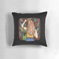 A soft, comfortable pillow with a fashion illustration design featuring a woman reading in a library setting.