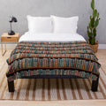 A soft, plush blanket with a library-inspired design, perfect for book lovers and reading enthusiasts.