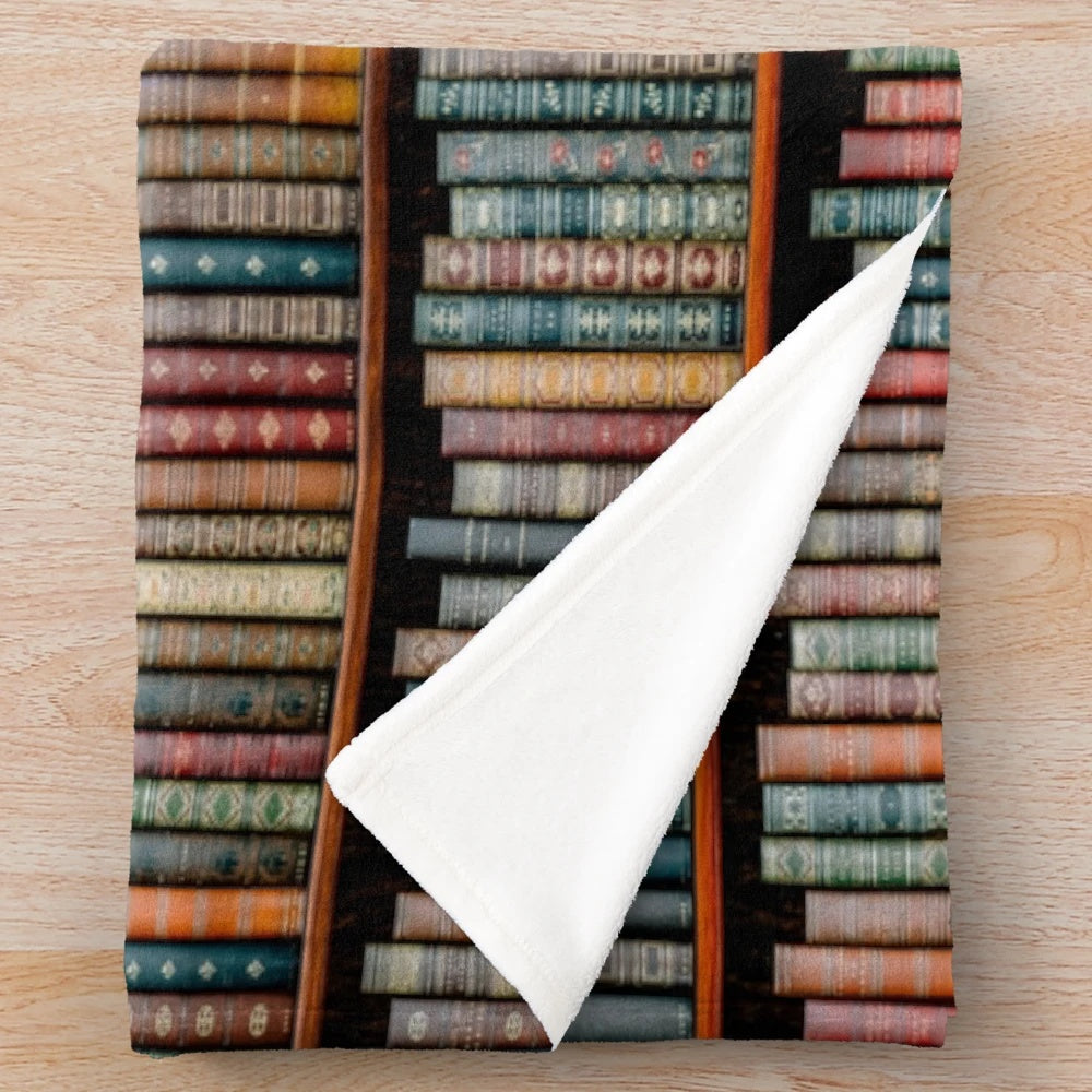 A soft, plush blanket with a library-inspired design, perfect for book lovers and reading enthusiasts.