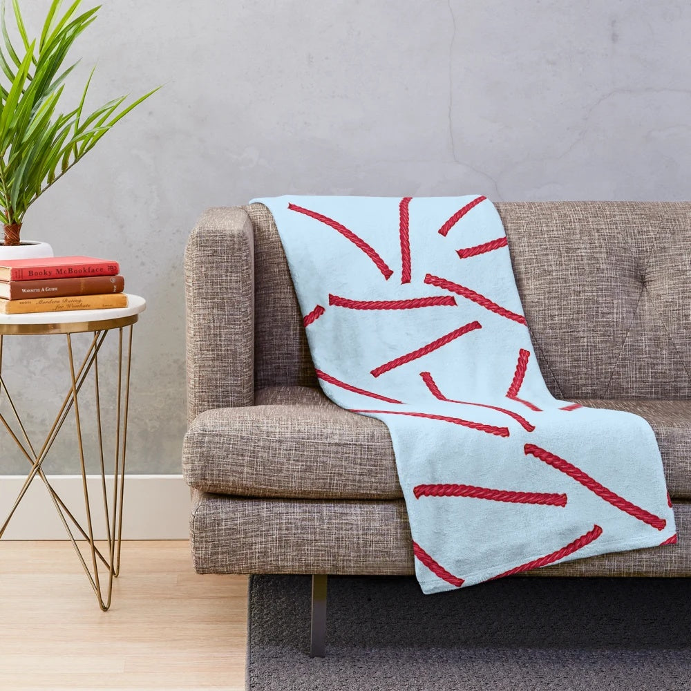 Red licorice candy-themed plush blanket