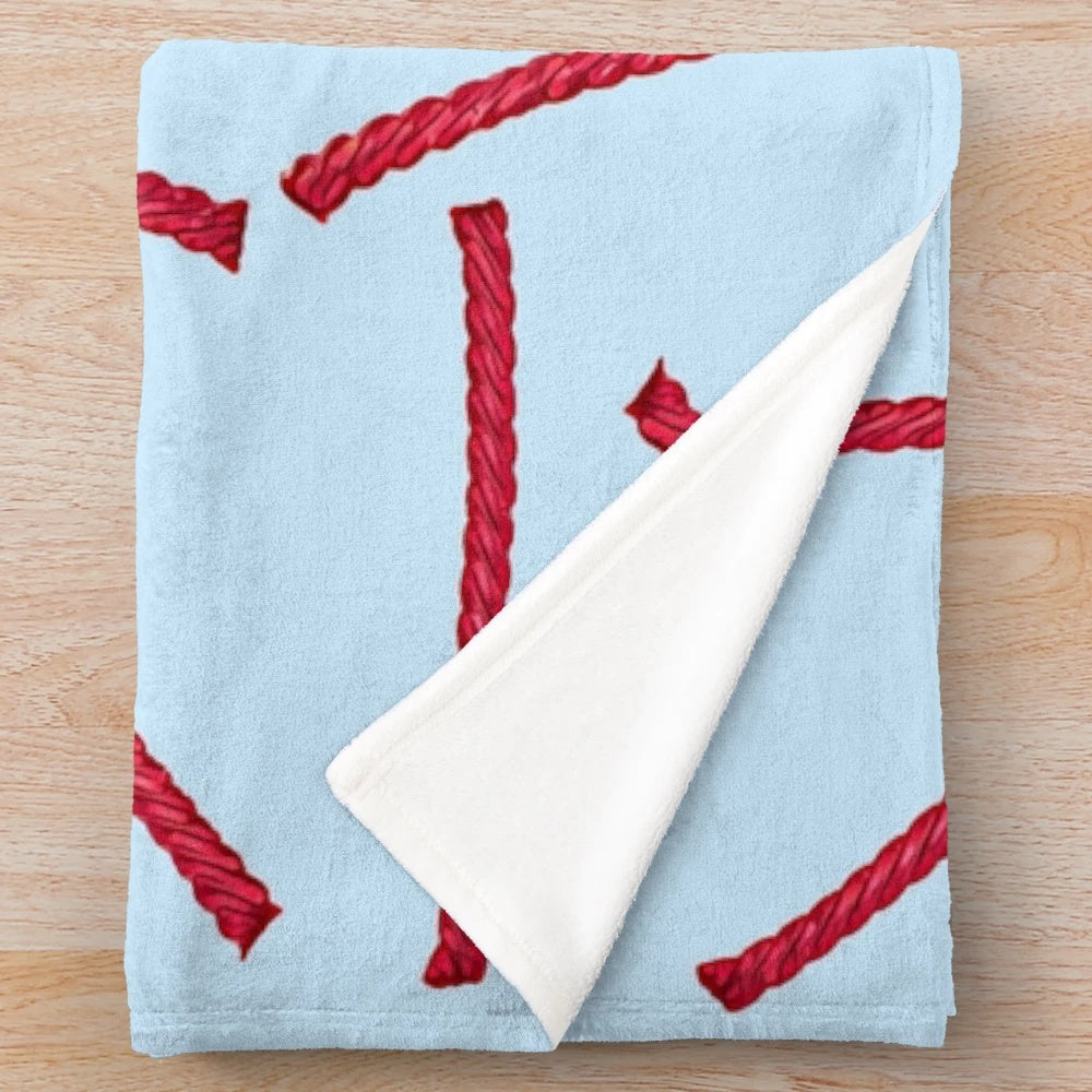 Red licorice candy-themed plush blanket