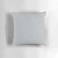 Soft, textured light gray pillow in a solid, simple design for comfortable home decor.