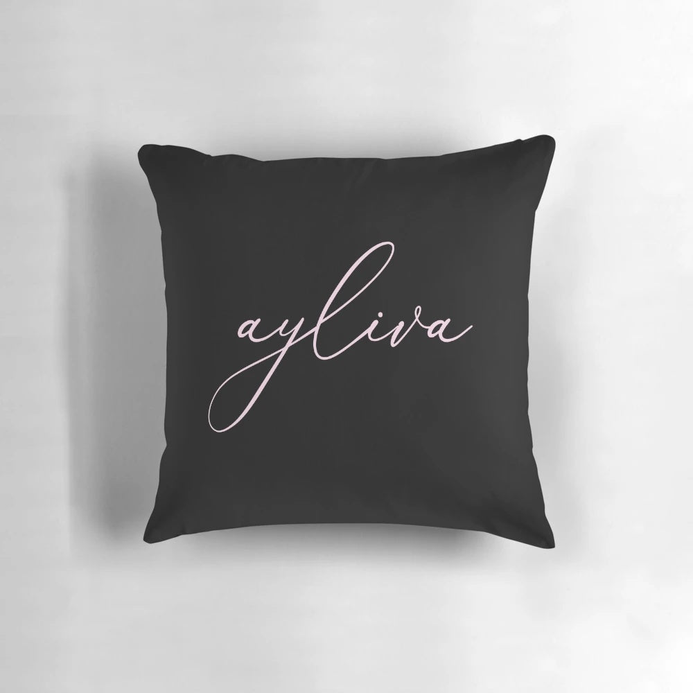 A soft, light pink decorative pillow for your bedroom or living space.