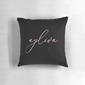 A soft, light pink decorative pillow for your bedroom or living space.
