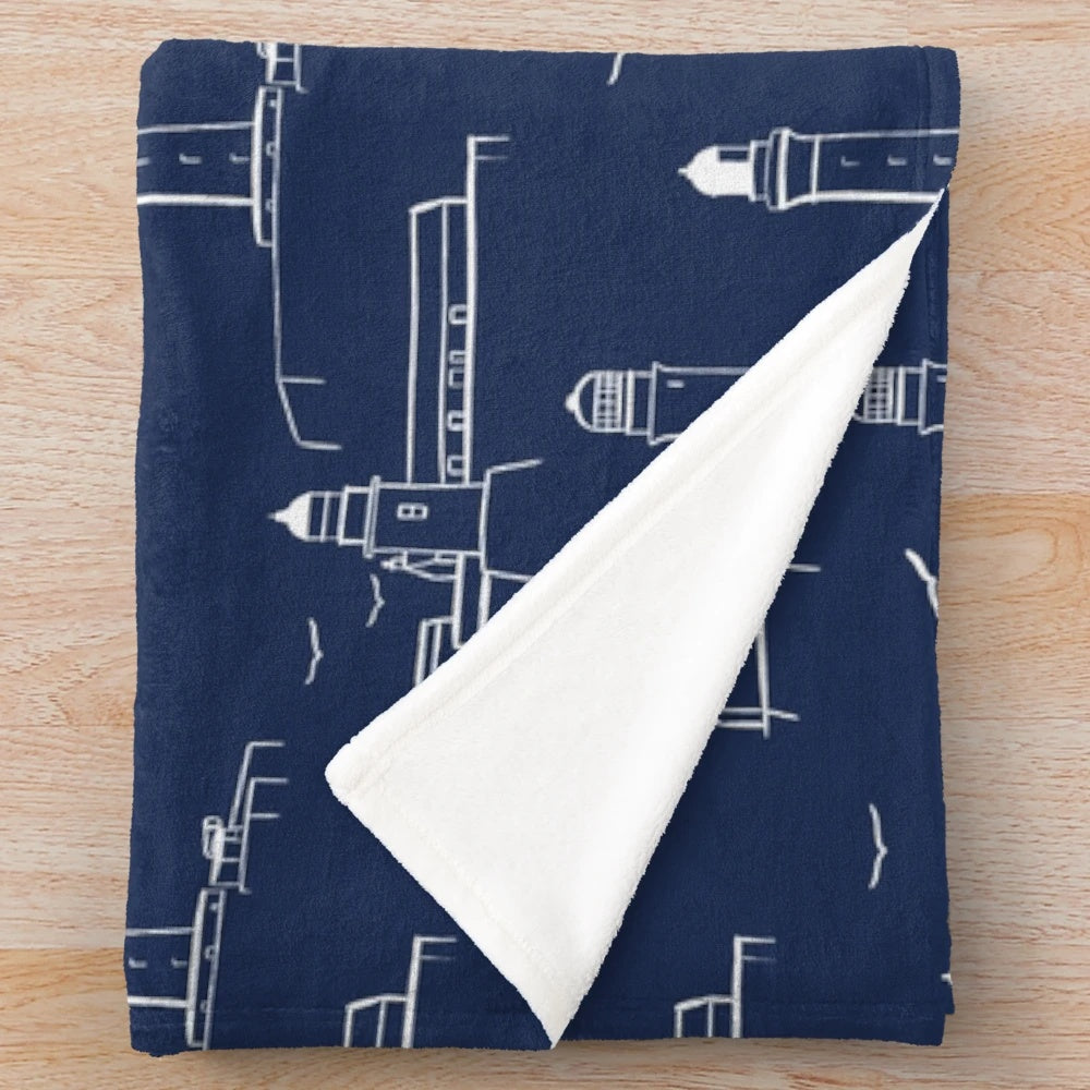 Lighthouse pattern plush blanket in white and dark blue