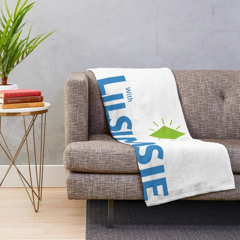 Lilsimsie-inspired plush blanket featuring gaming elements like plumbob and cowplant