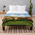 Limousin cow plush blanket with soft, hairy texture
