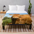 Soft and plush limousin cow blanket for a cozy, rustic farmhouse look