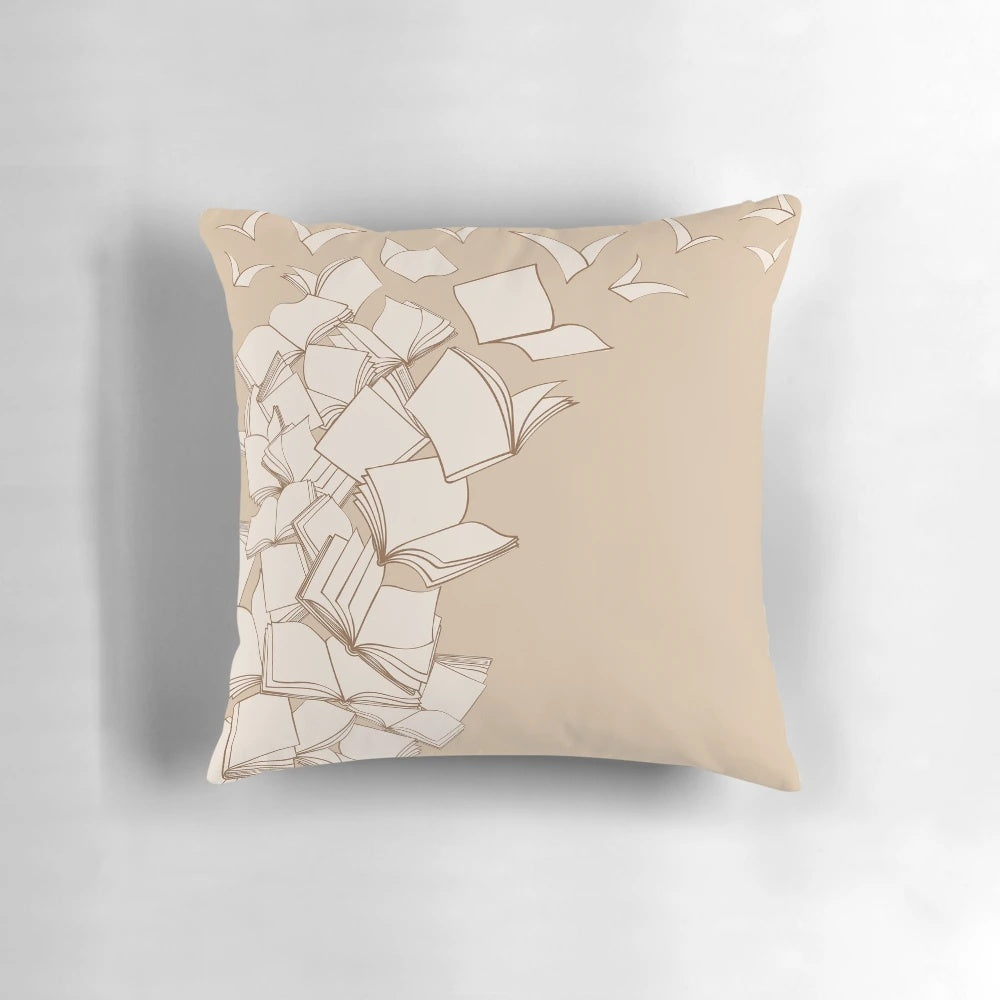 Plush pillow with a stack of books and flying birds, ideal for book lovers