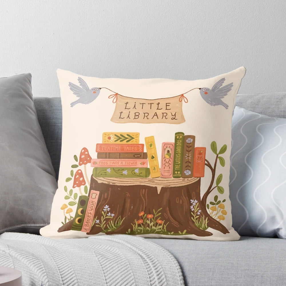 A plush, book-themed pillow with a charming "Little Library" design, perfect for book lovers and readers.