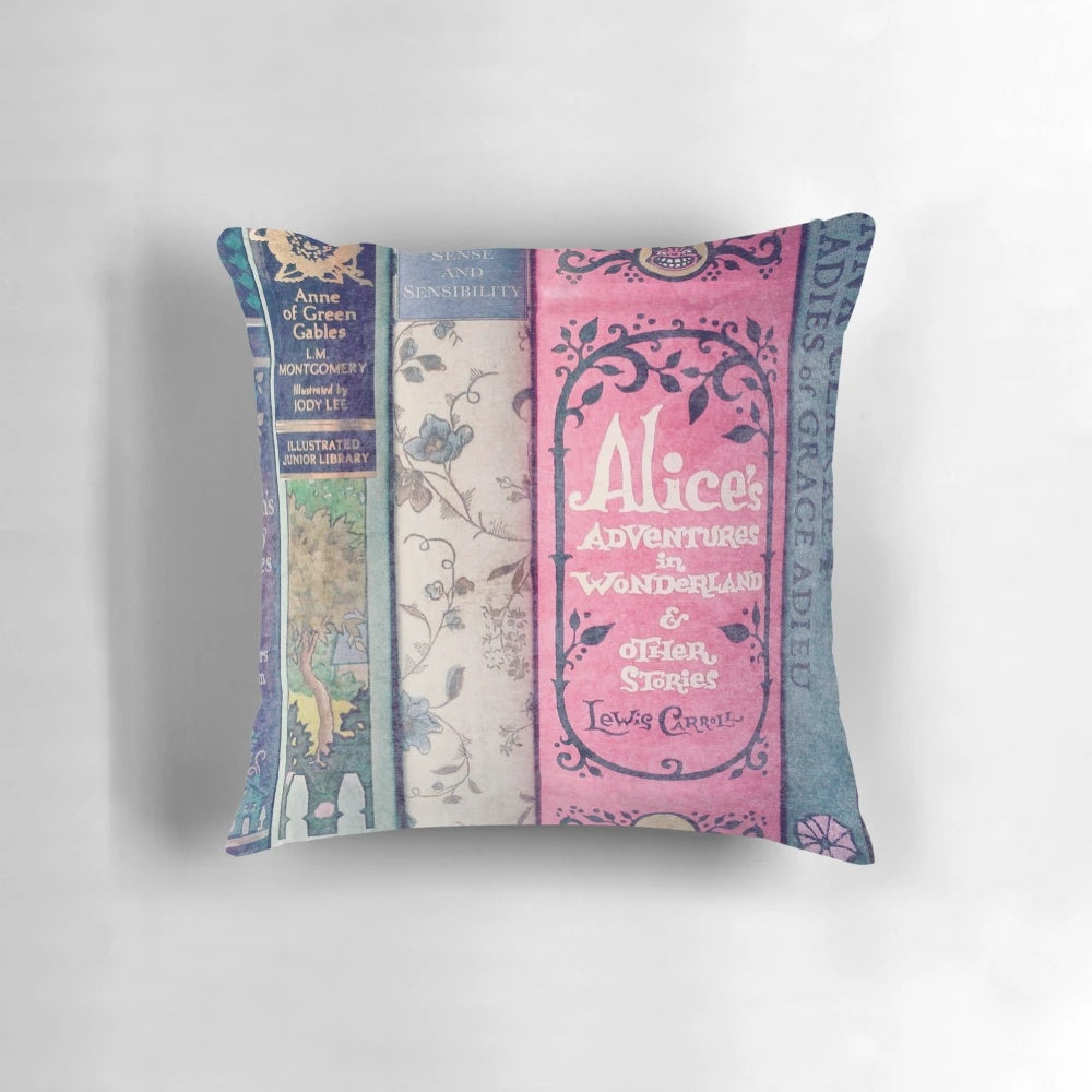 A plush, pink pillow with a literary design, perfect for book lovers and library decor.