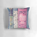 A plush, pink pillow with a literary design, perfect for book lovers and library decor.