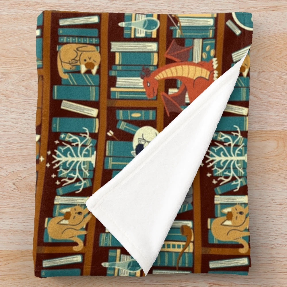 Plush blanket with fantasy book and animal design