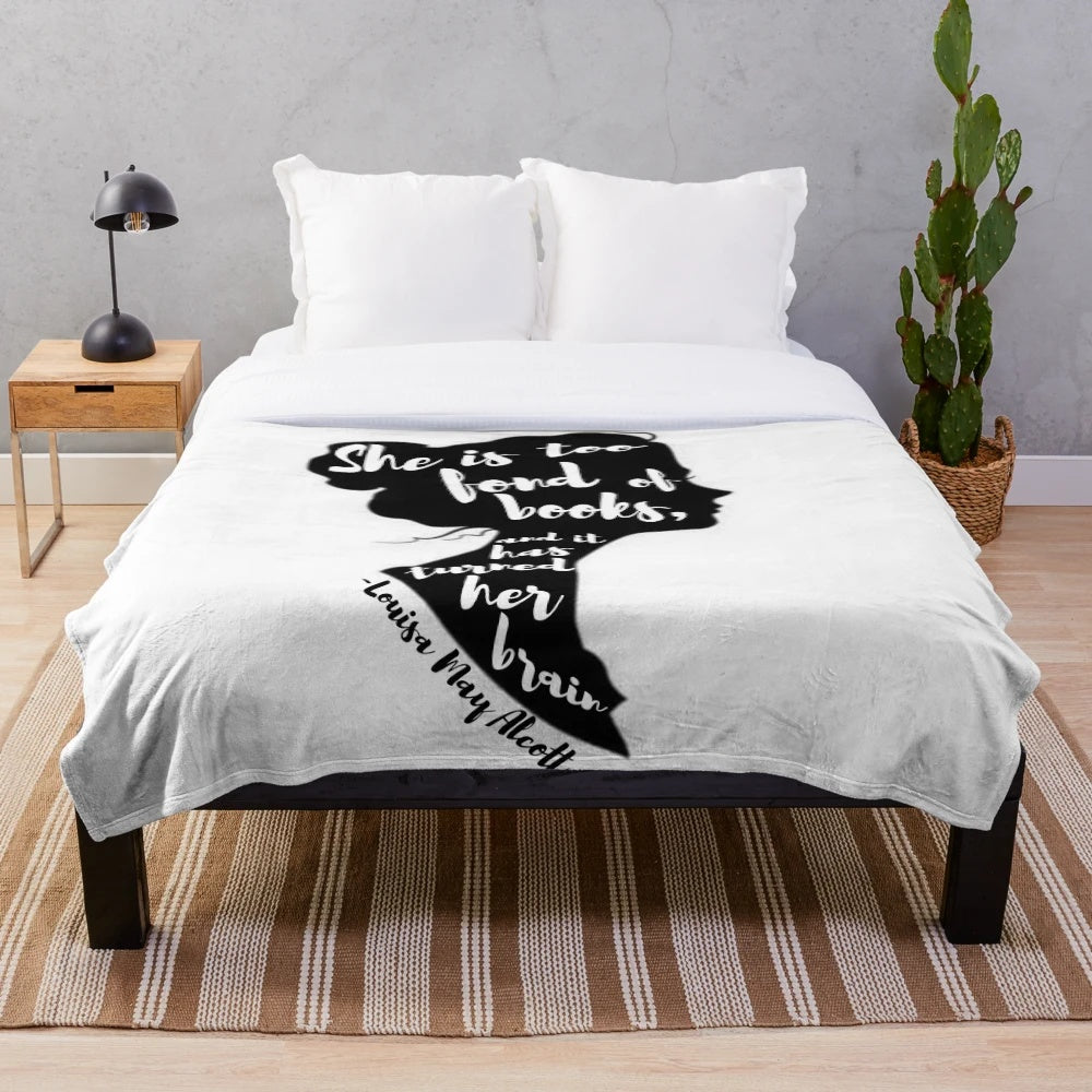 Plush blanket featuring a literary quote from Louisa May Alcott