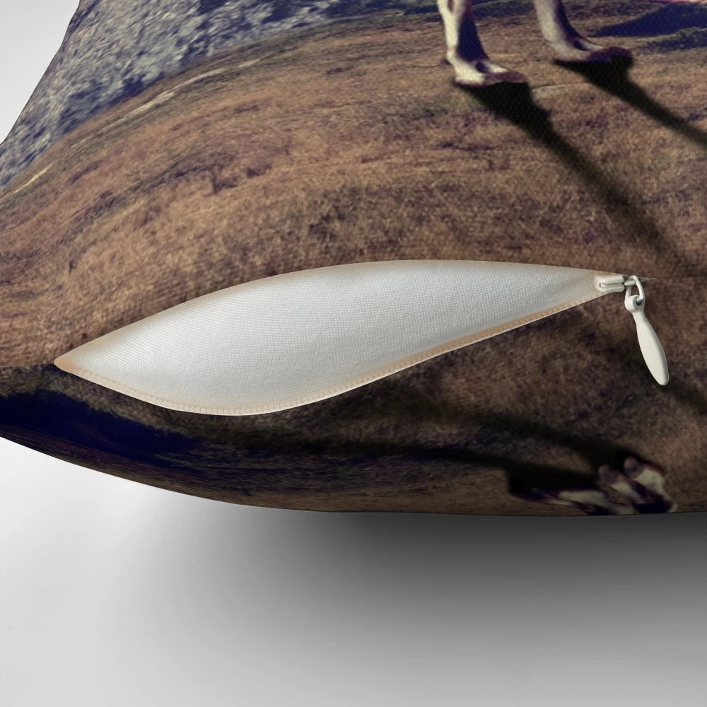 Soft, plush llama pillow with a collage-style graphic design