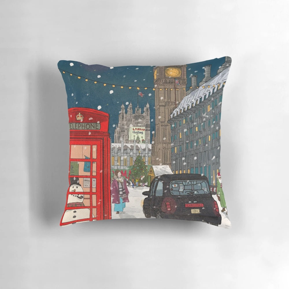 Festive London cityscape art printed on a plush accent pillow, featuring holiday elements like snowflakes and a snowy night sky